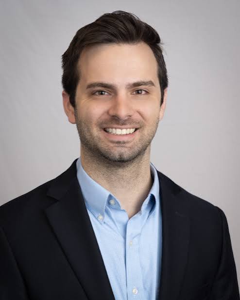 Portrait of Colin Slabach, Ph.D., CFP®
